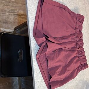 Lululemon 
Mauve 
On the Fly shorts
Size 6